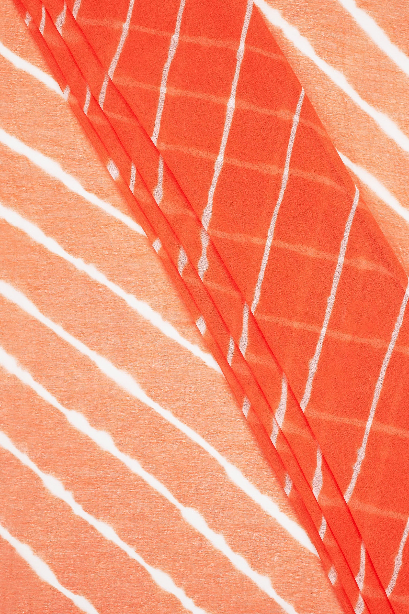 Teejh Pica Chiffon Peach Leheriya Saree
