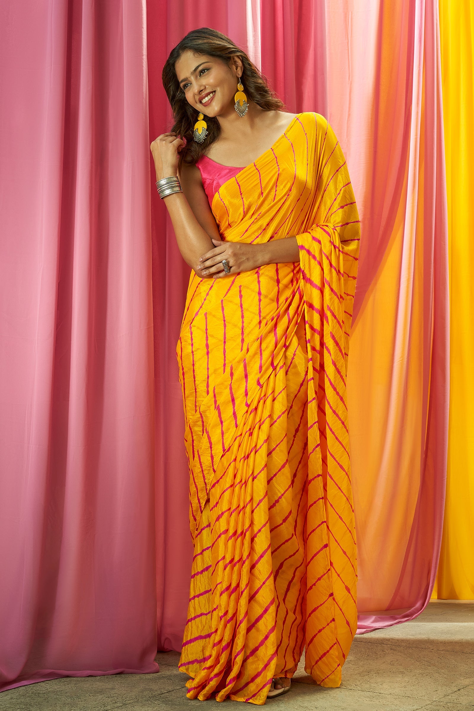 Teejh Guldasta Chinon Yellow and Pink Leheriya Saree