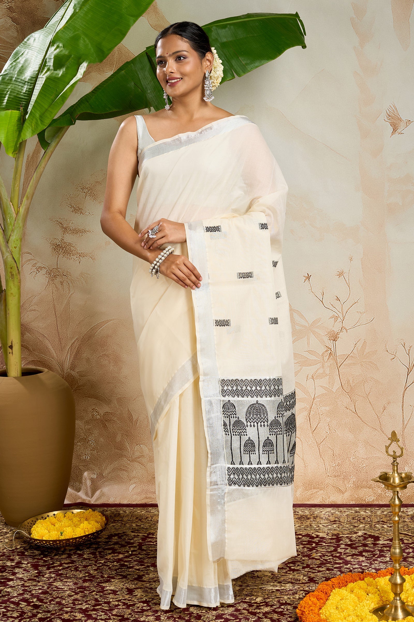 Teejh Mausami Cotton Off white and Black Kasavu Saree