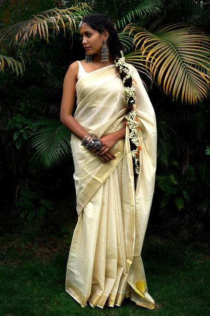 Teejh Ariata Golden Kerala Tissue Kasavu saree