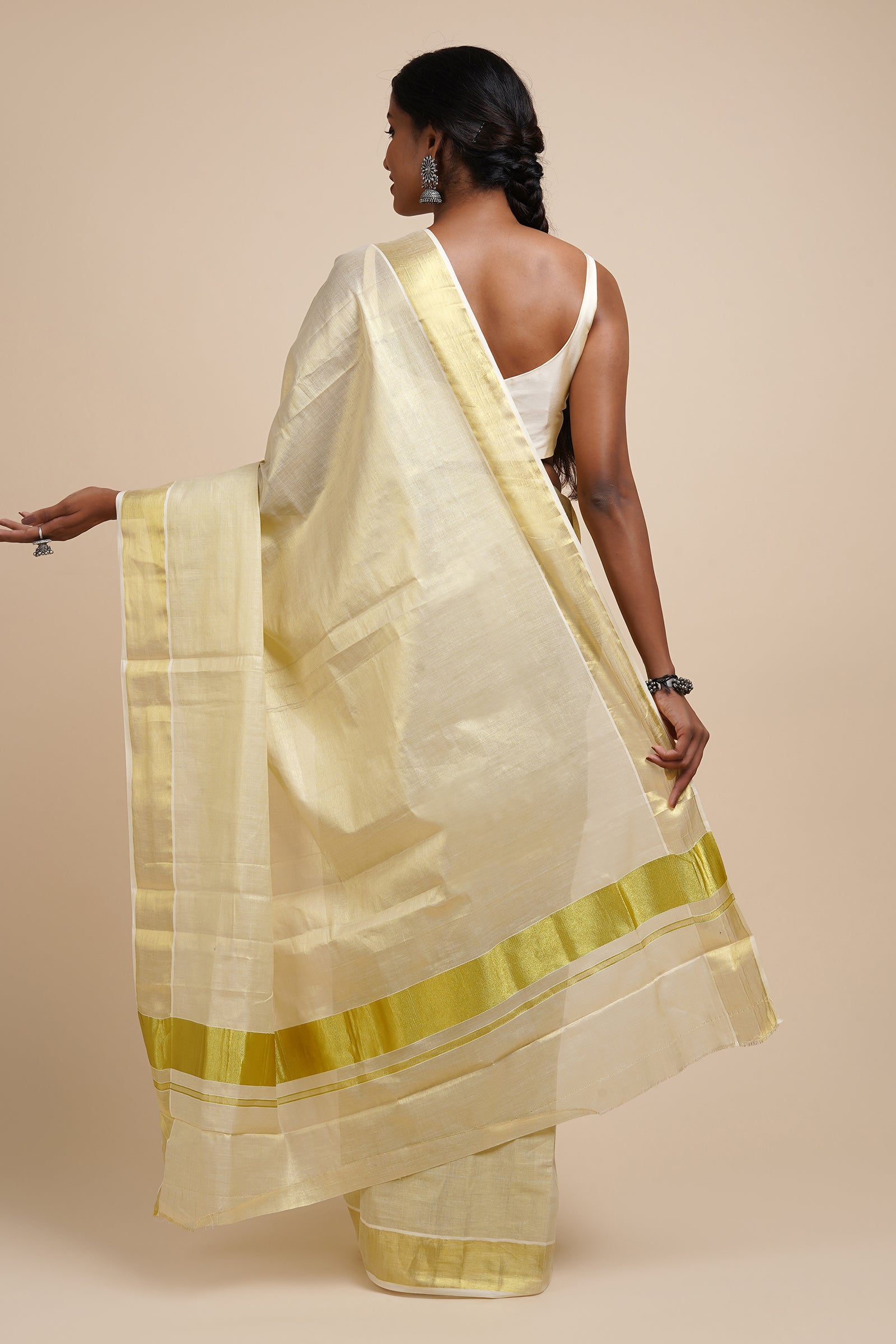 Teejh Ariata Golden Kerala Tissue Kasavu saree