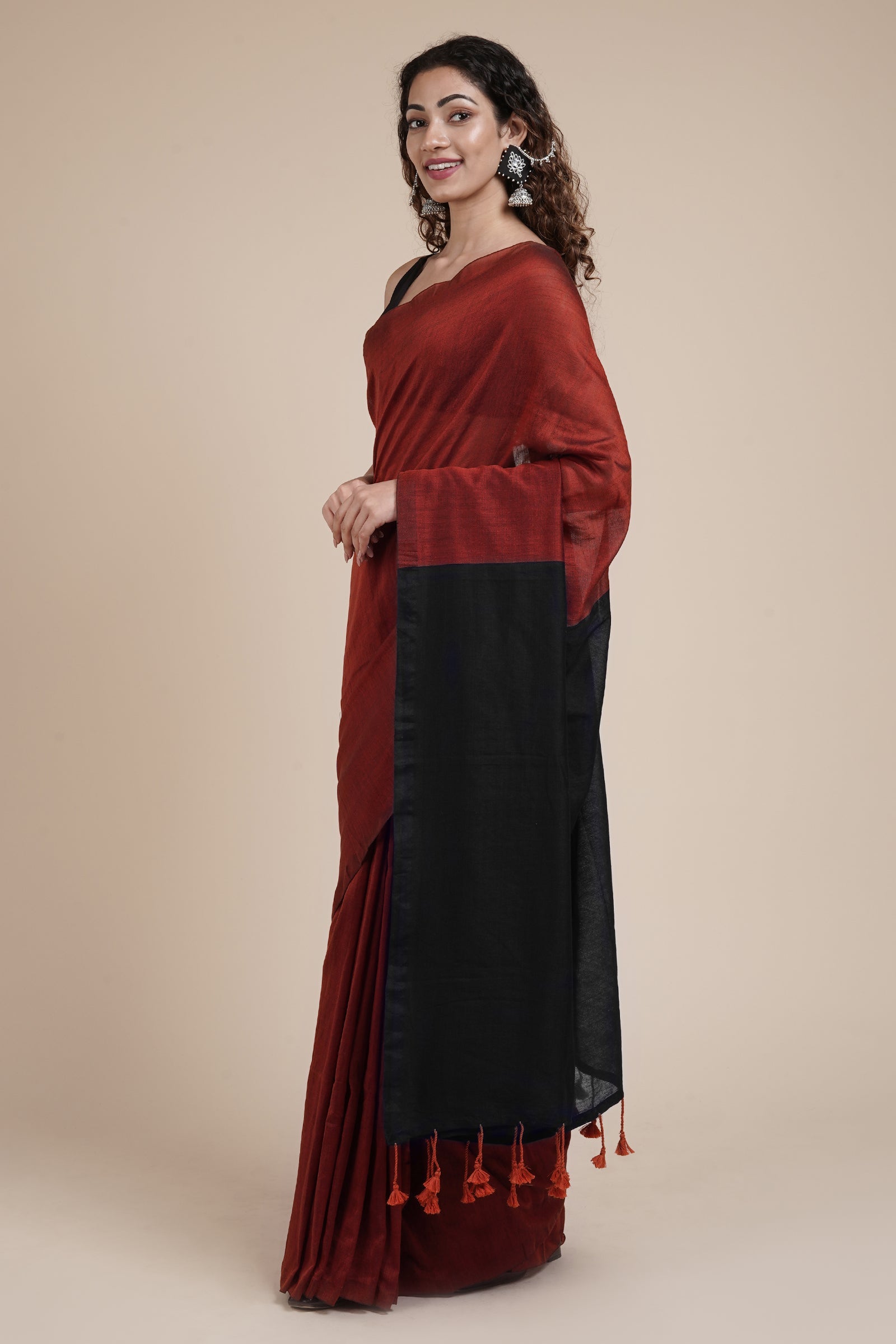 Teejh Varuni Rust Orange & Black Mulmul Saree