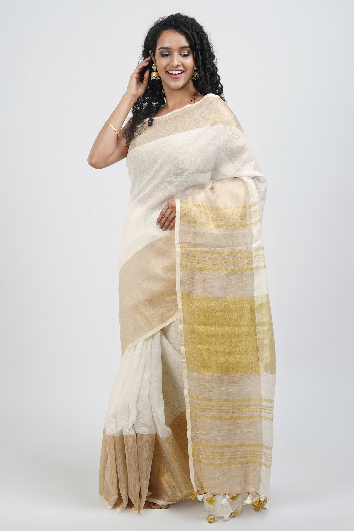 Teejh Laboni White & Gold Linen Saree