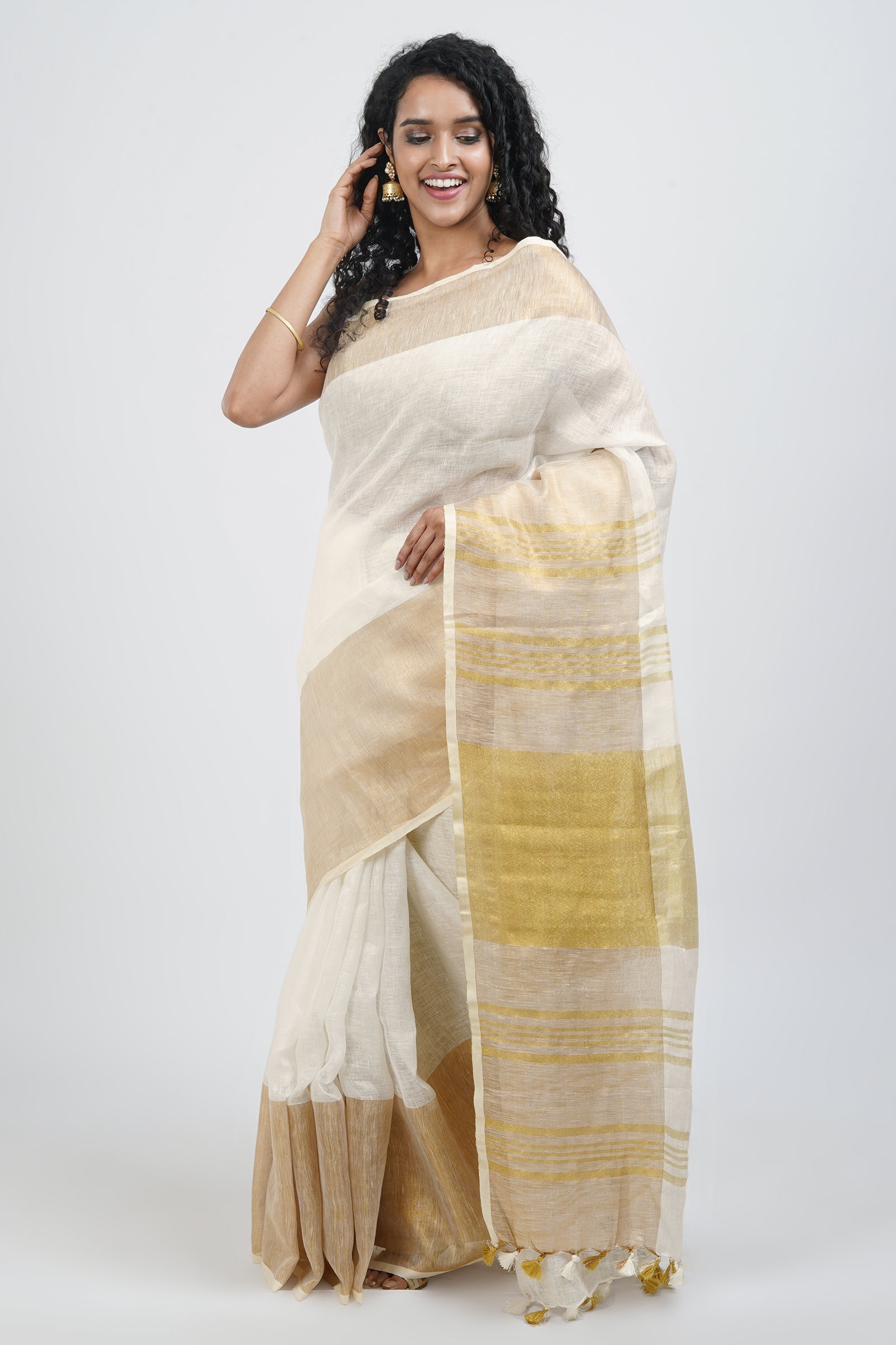 Teejh Laboni White & Gold Linen Saree