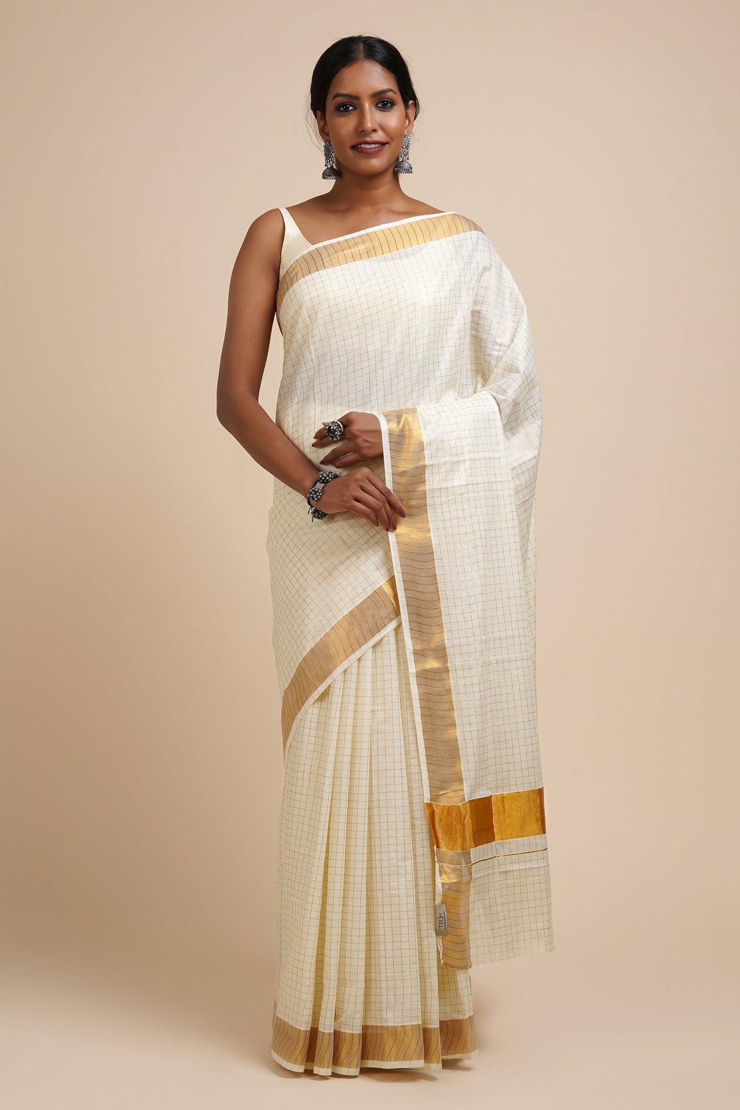 Teejh Padma White and Gold Kerala Cotton Kasavu Saree