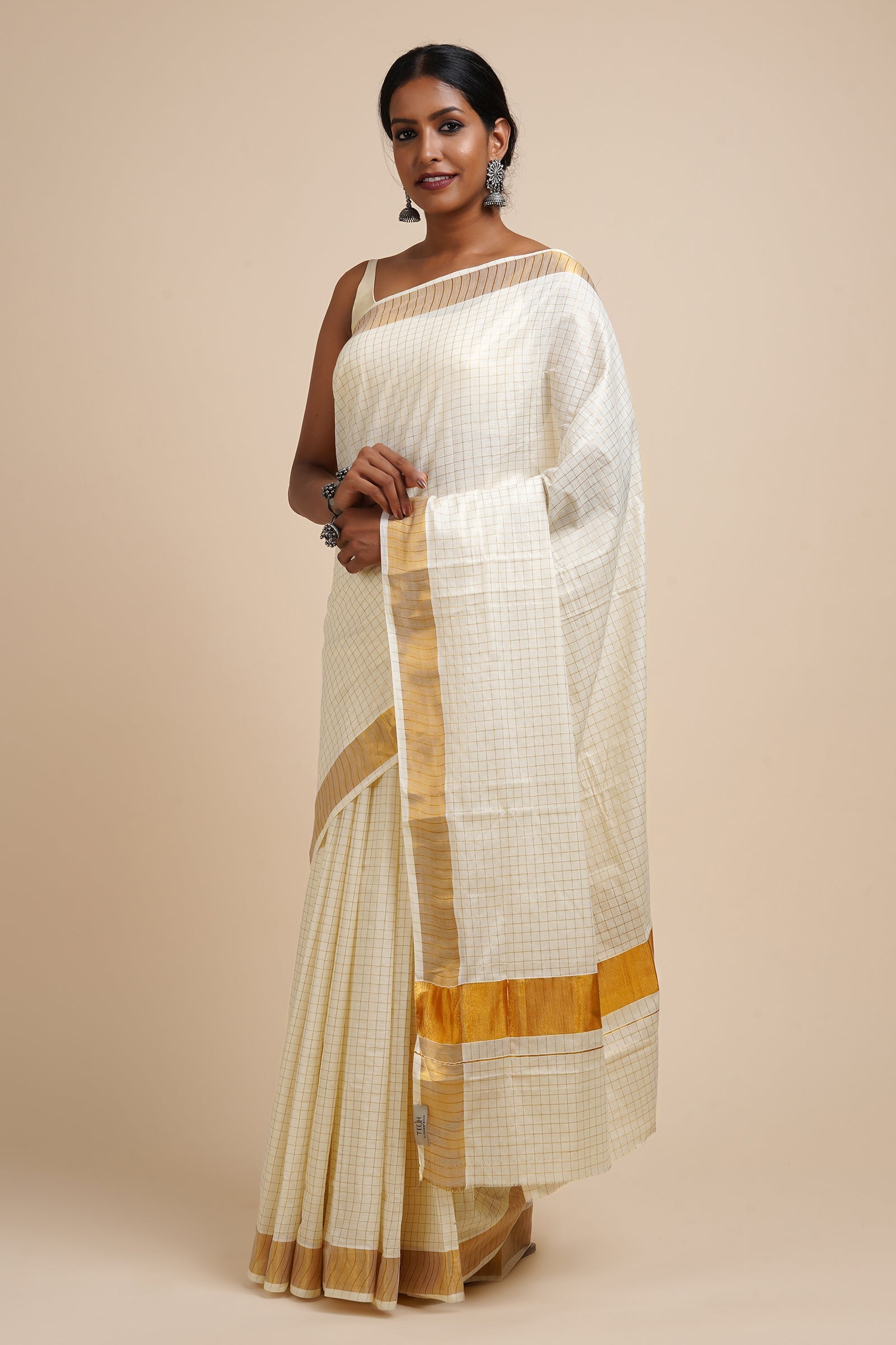 Teejh Padma White and Gold Kerala Cotton Kasavu Saree