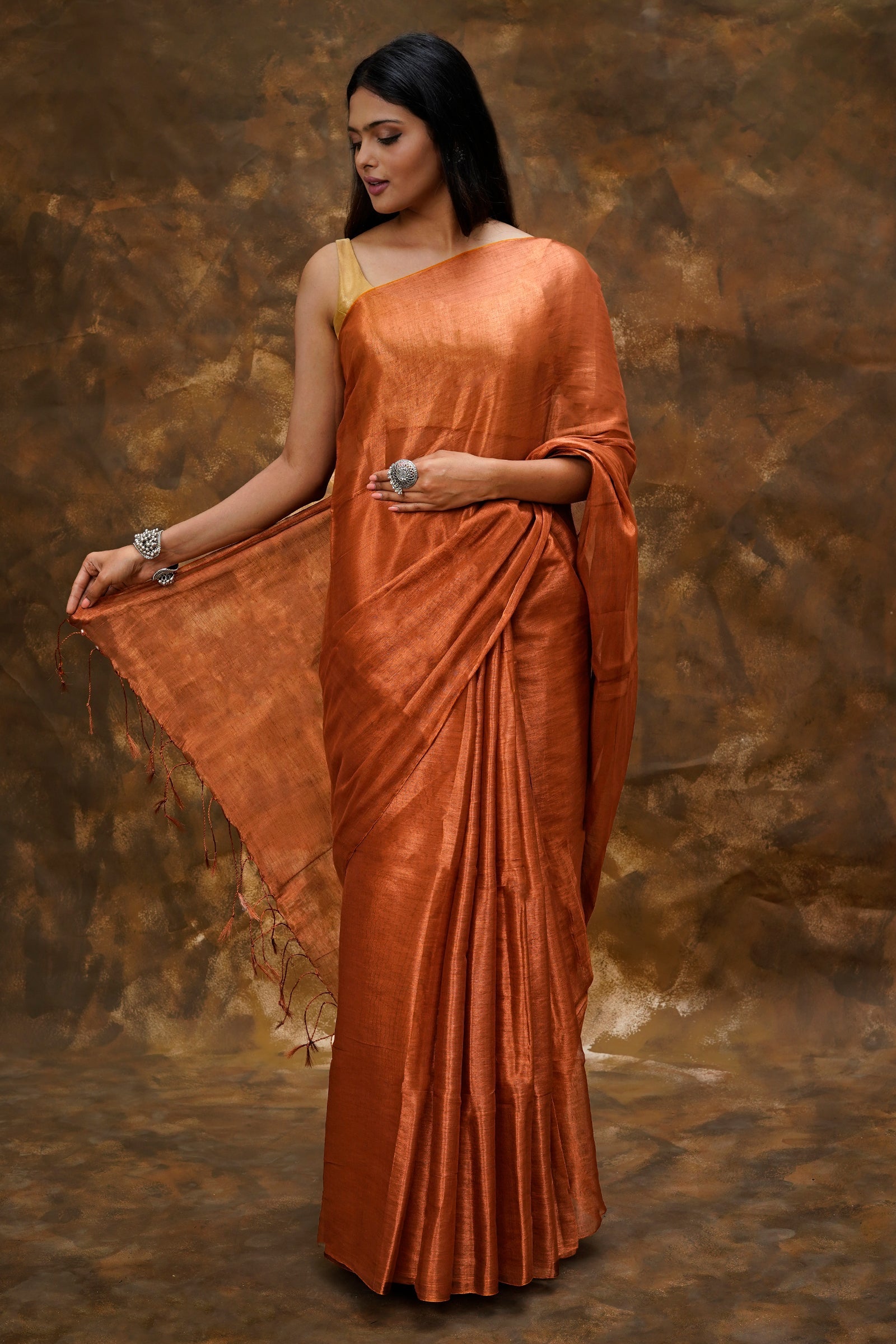 Teejh Trishika Copper Brown Tissue Saree