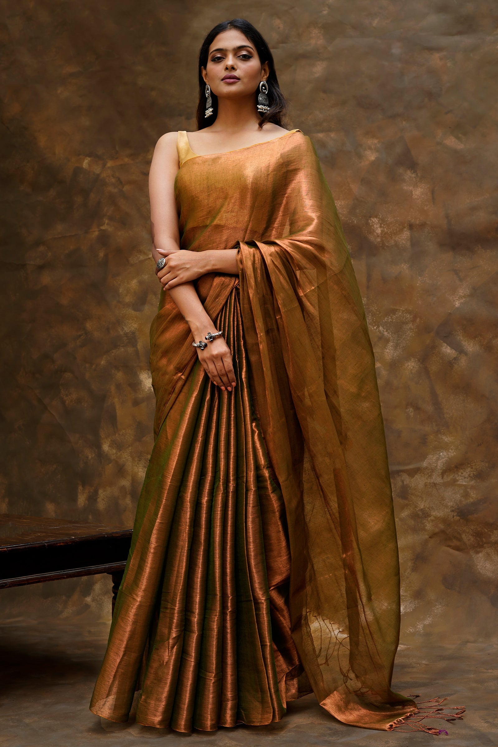 Teejh Trishika Rust Green Tissue Saree