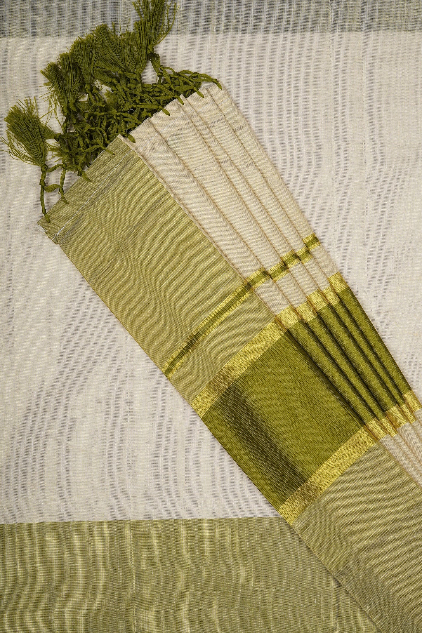 Teejh Valapatnam Kerala Tissue Light green Saree