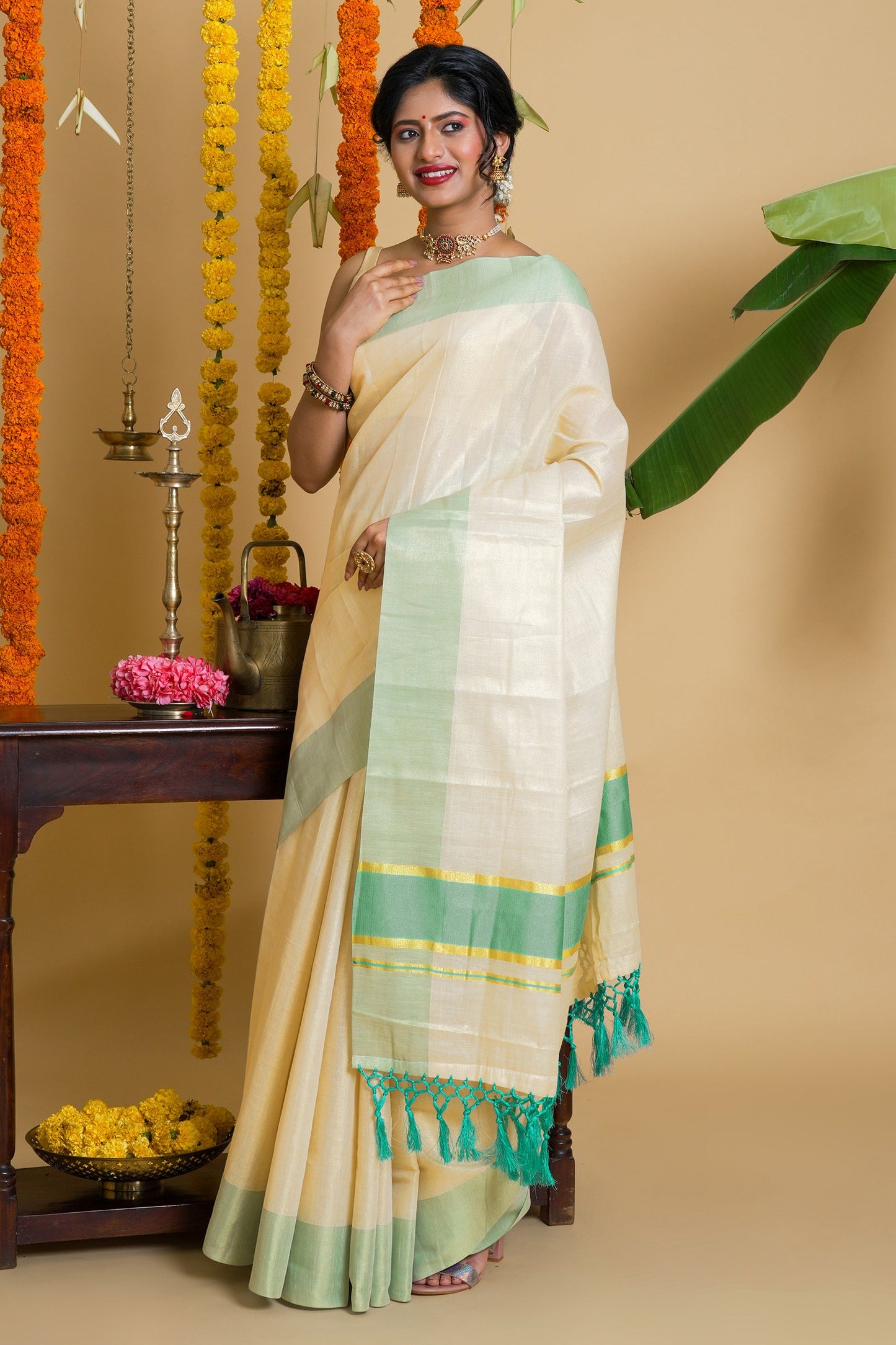 Teejh Muvatupuzha Kerala Tissue Turquoise Saree