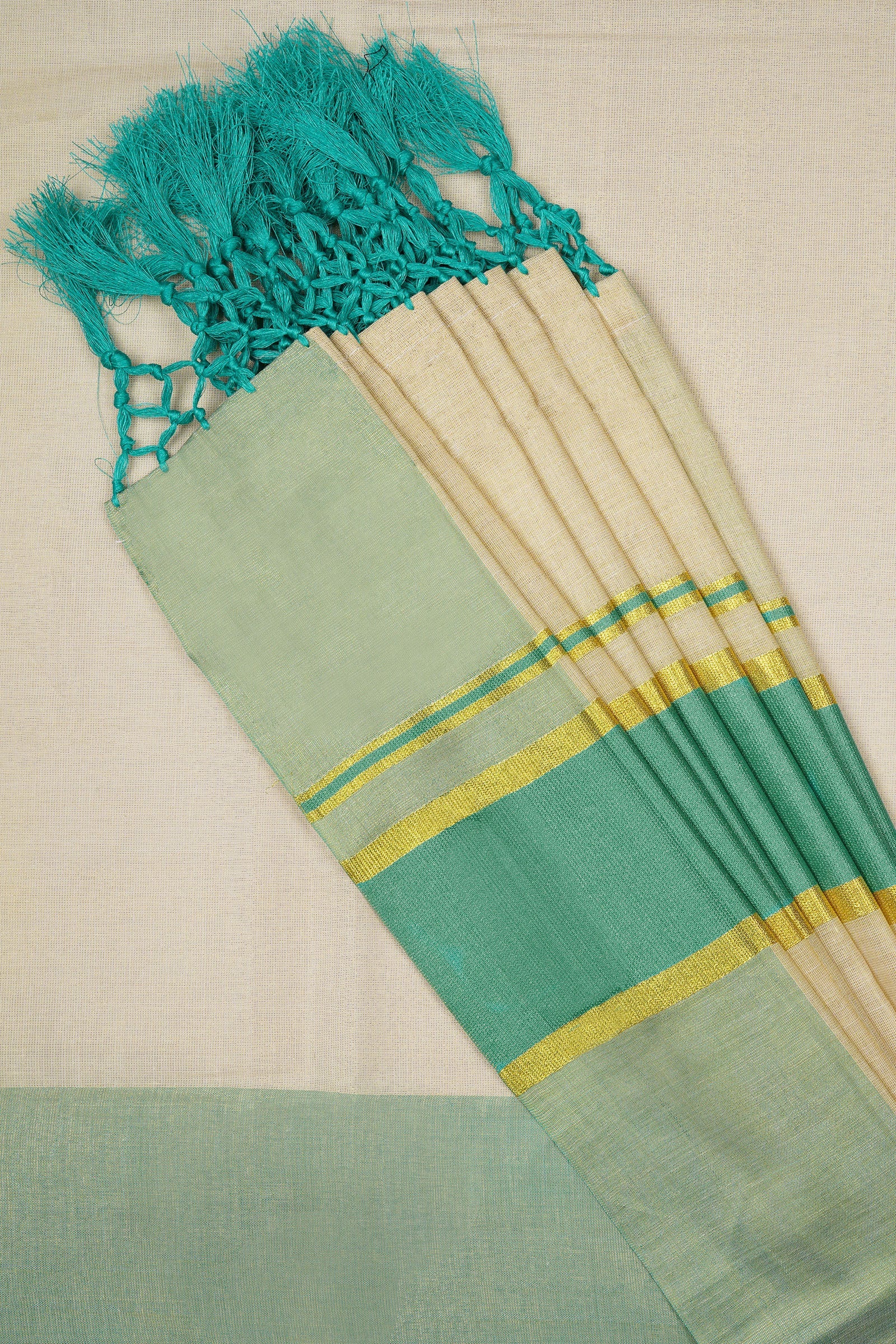 Teejh Muvatupuzha Kerala Tissue Turquoise Saree