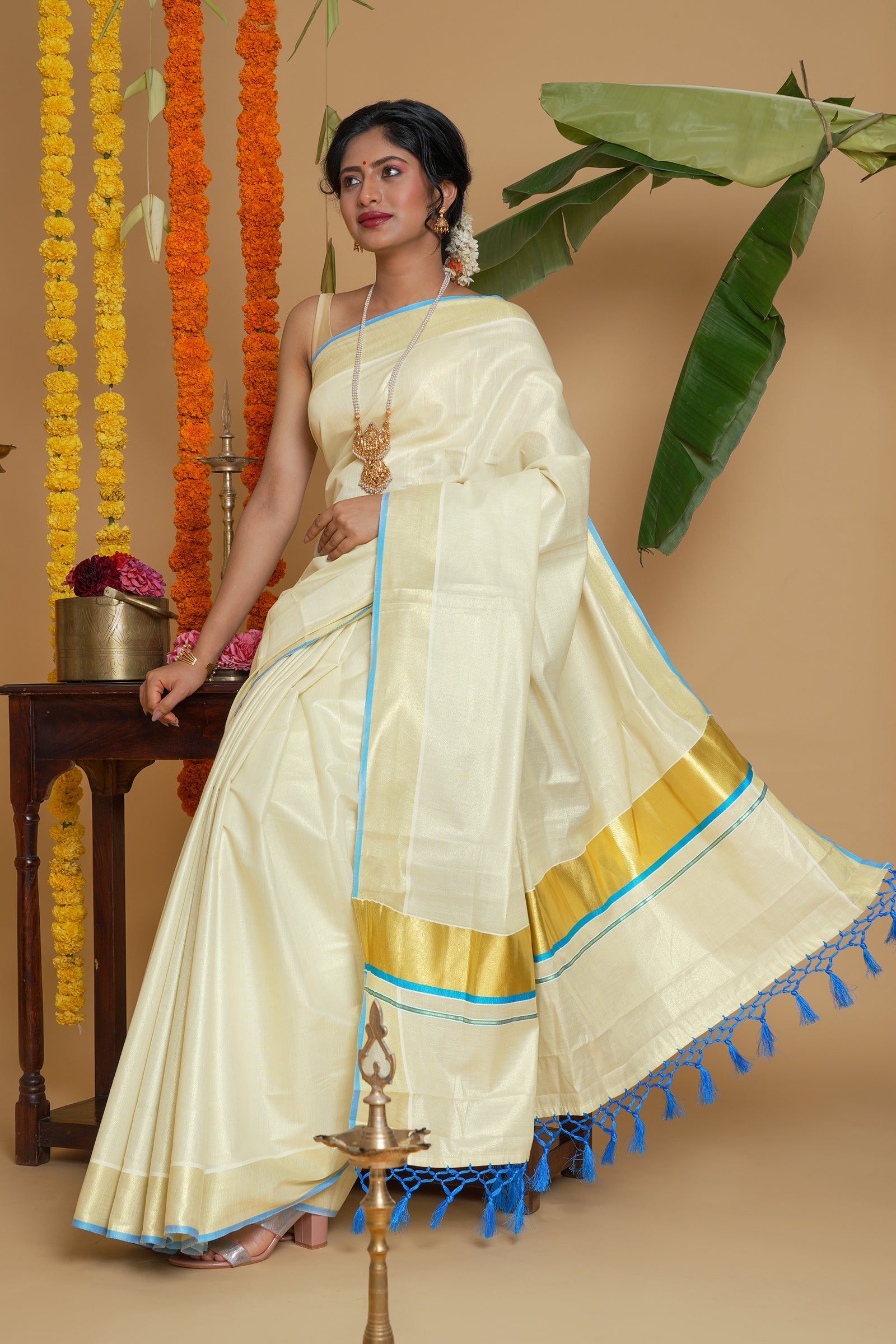 Teejh Dal Kerala Tissue Blue saree