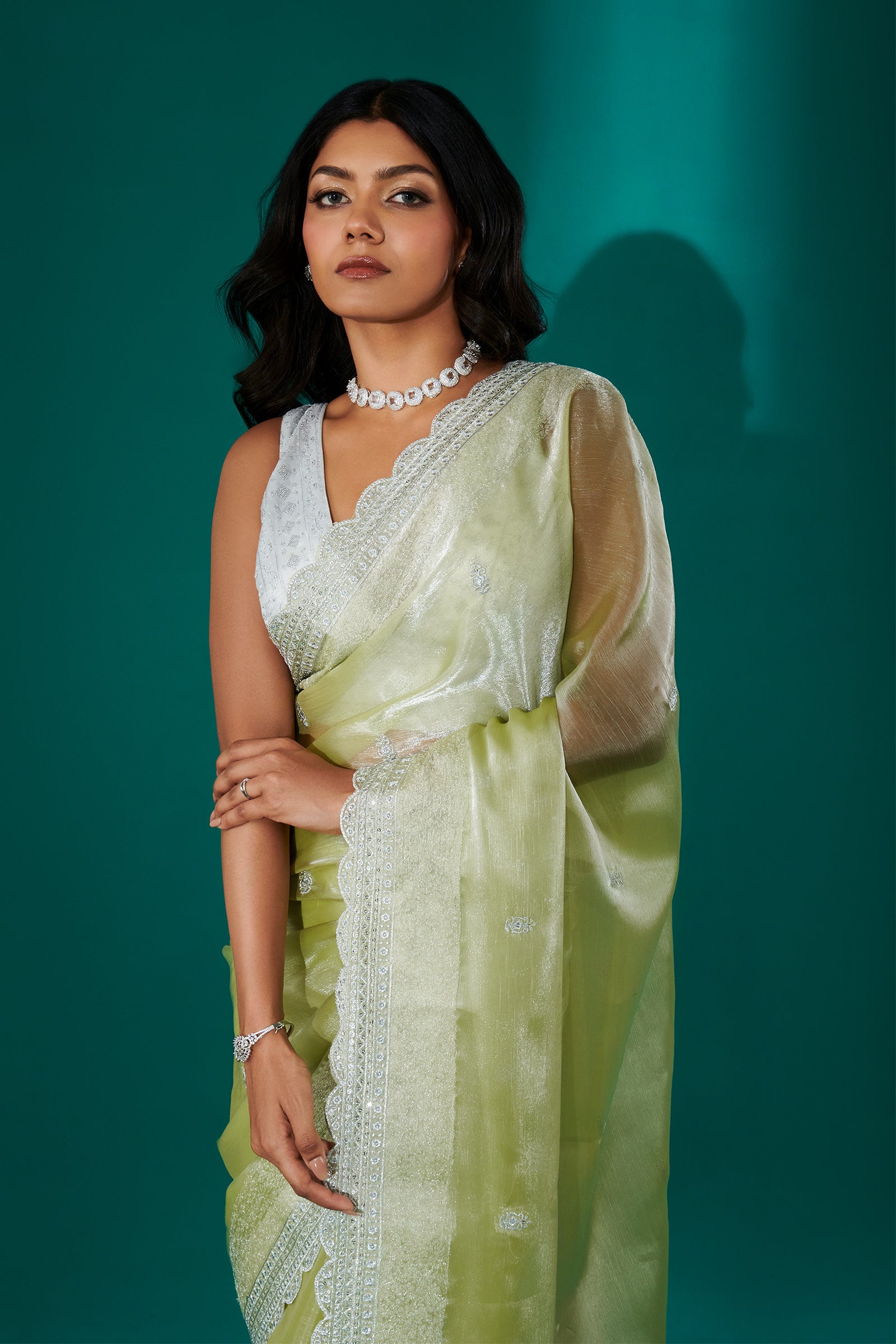 Teejh Geetanjali Green Shimmer Tissue Saree