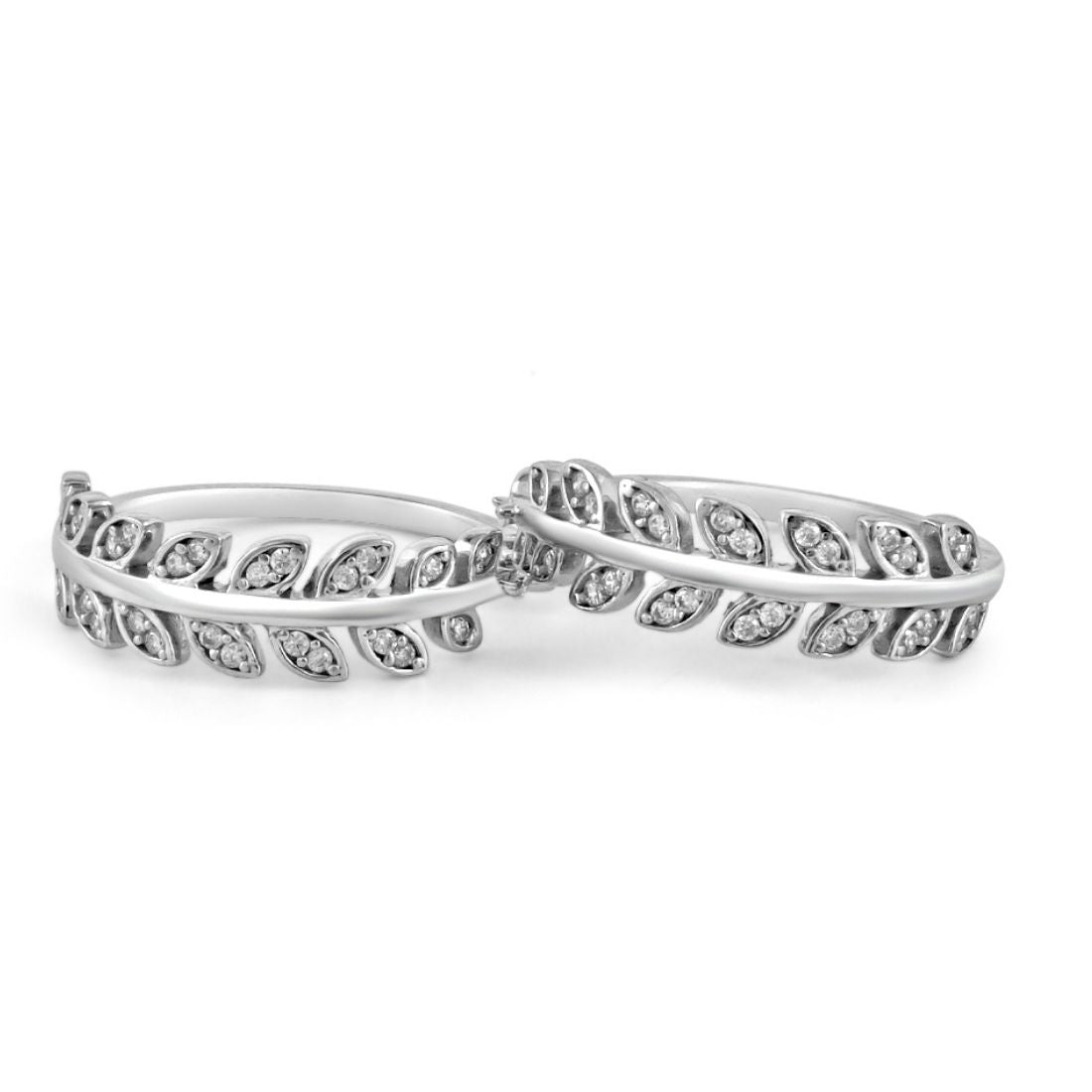 Pair of women's 925 Sterling Silver toe rings featuring a leafy silver vine design with small stones. – Zavya