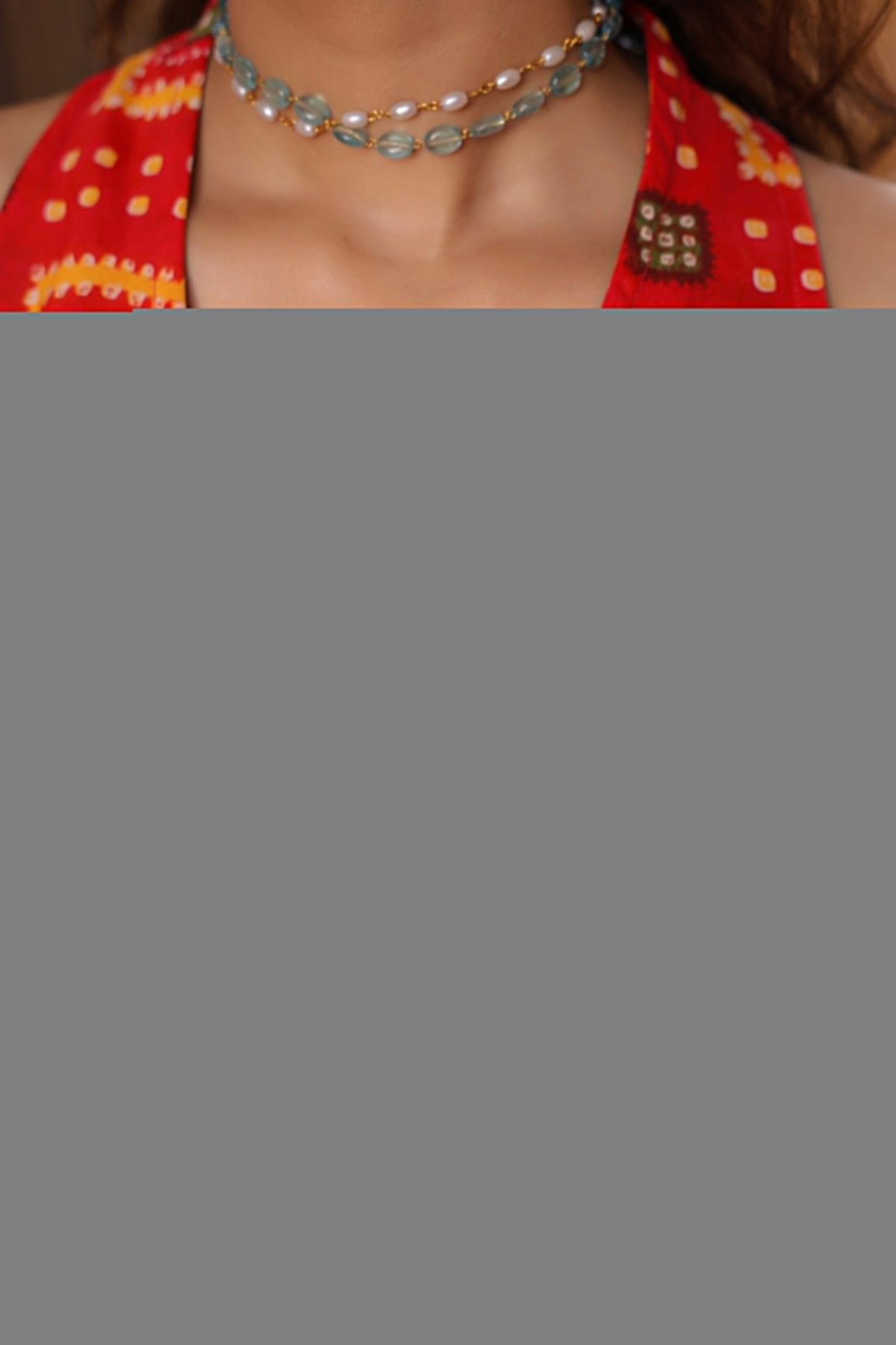 V-neck sleeveless red top