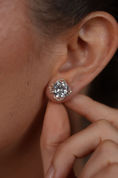 4 carat Diamond Solitaire with Petal Halo studs