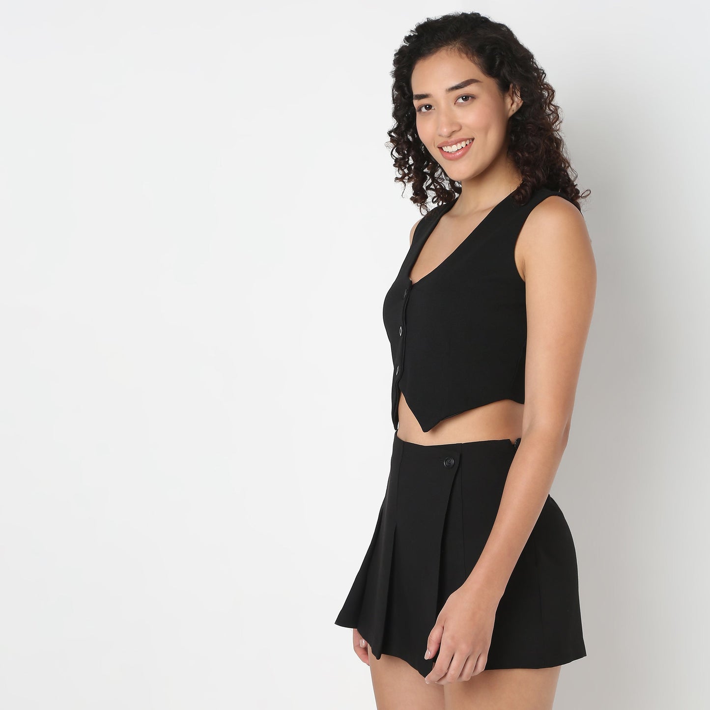 Young Women Vest, Sleeveless V Neck Fitted Body with Button Opening.