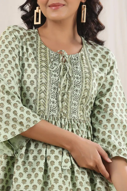 Women Green Ethnic Tie-Up Neck Peplum Top