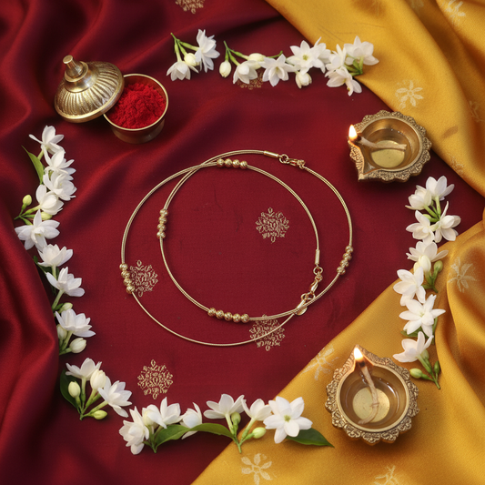 Cultural flat lay with gold anklets