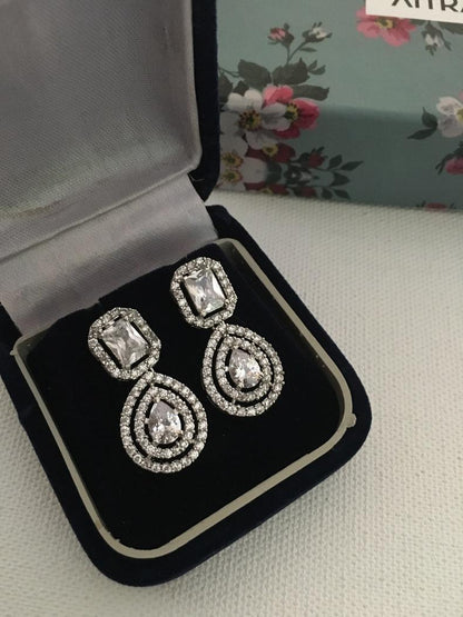 Double Solitaire Earrings - Attrangi