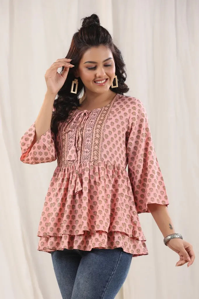 Peach Ethnic Motifs Printed Tie-Up Neck Peplum Top