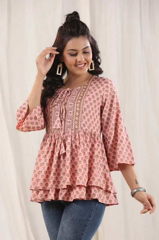 Peach Ethnic Motifs Printed Tie-Up Neck Peplum Top