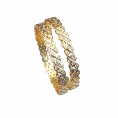 Gold bangles with white background