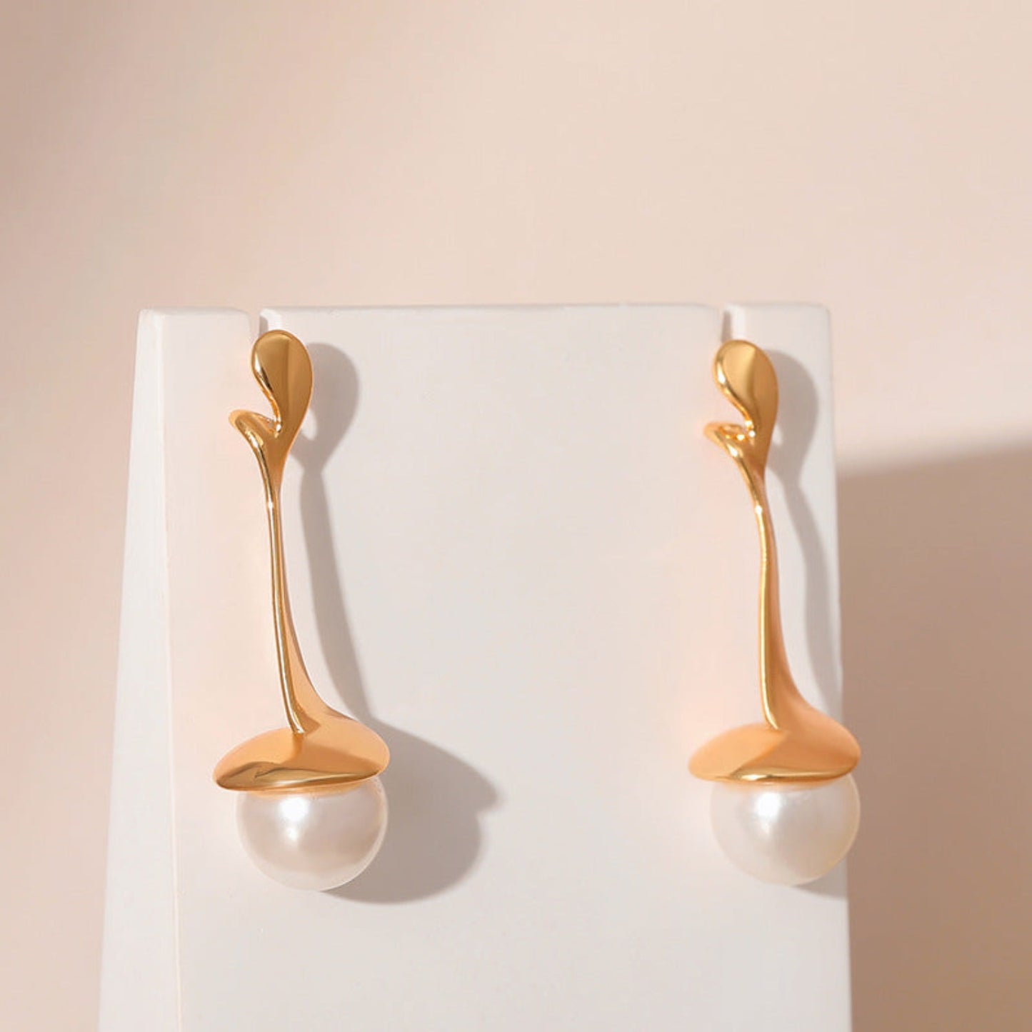 Gold Fluid Pearl Drop Stud earrings JLT12337