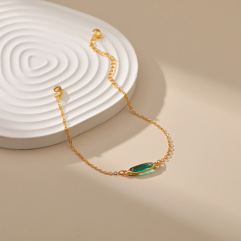 Just Lil Things Artificial "Emerald Glow Minimal Bracelet – Sleek Green Stone with Golden Chain" - jltb0345