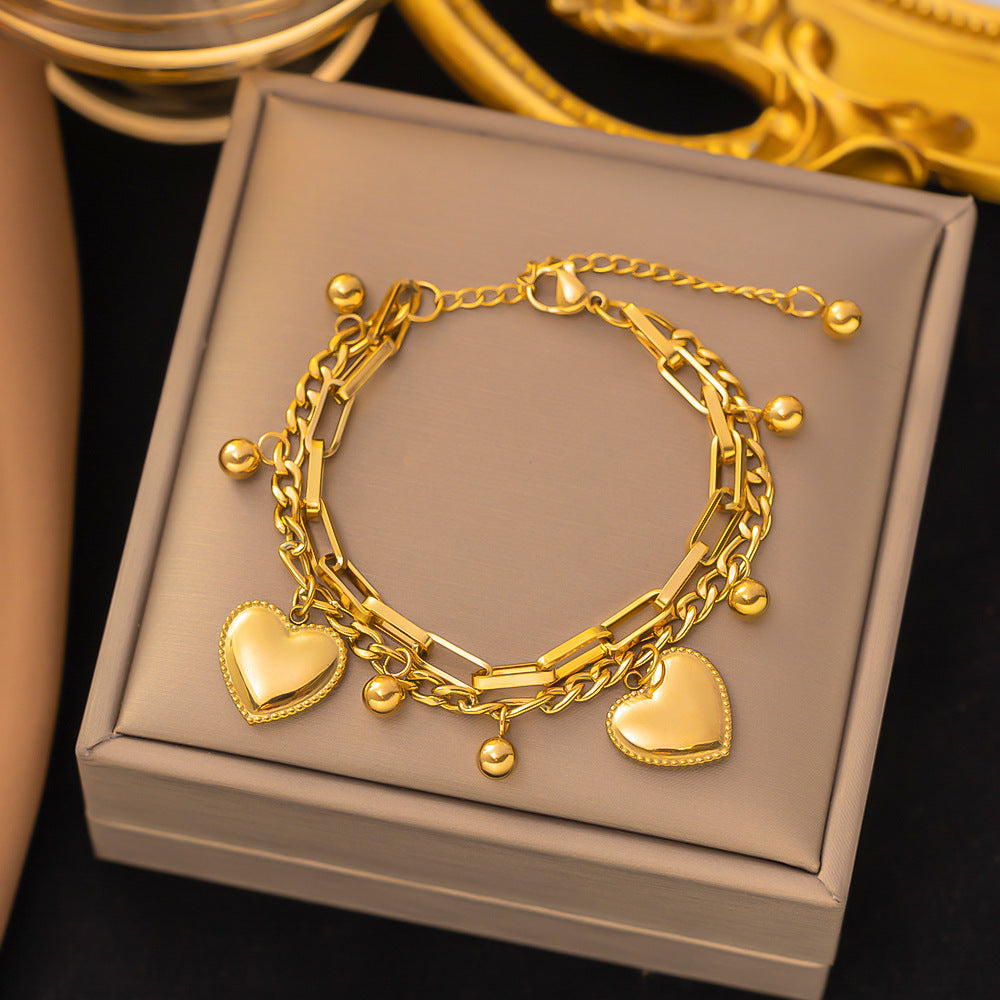 Just Lil Things Artificial Golden Heart Charm Bracelet & Link Chain Duo – Elegant Layered Set    Bracelets