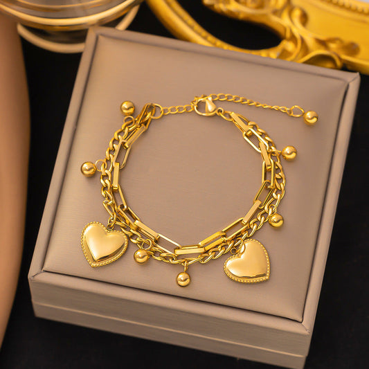 Just Lil Things Artificial Golden Heart Charm Bracelet & Link Chain Duo – Elegant Layered Set    Bracelets