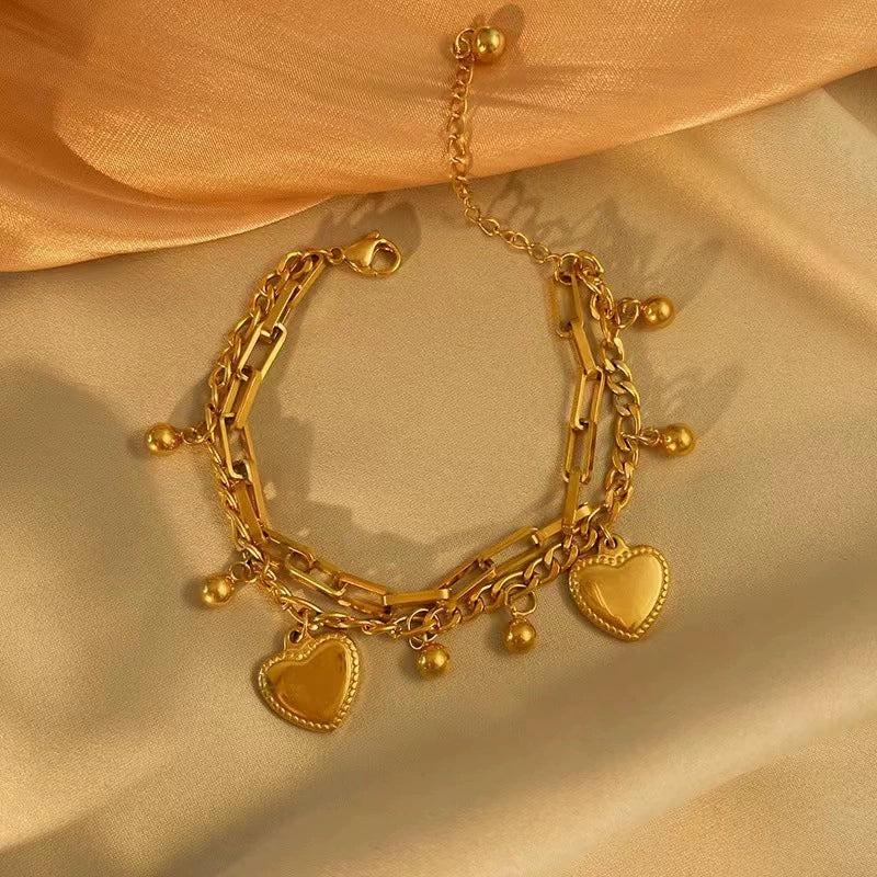 Just Lil Things Artificial Golden Heart Charm Bracelet & Link Chain Duo – Elegant Layered Set    Bracelets