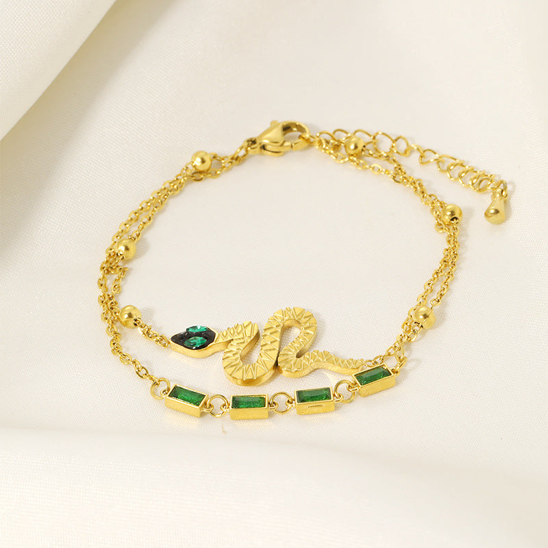 Serpent Charm Bracelet with Green Gem Accents – Dual Layer Gold Chain JLTB0547