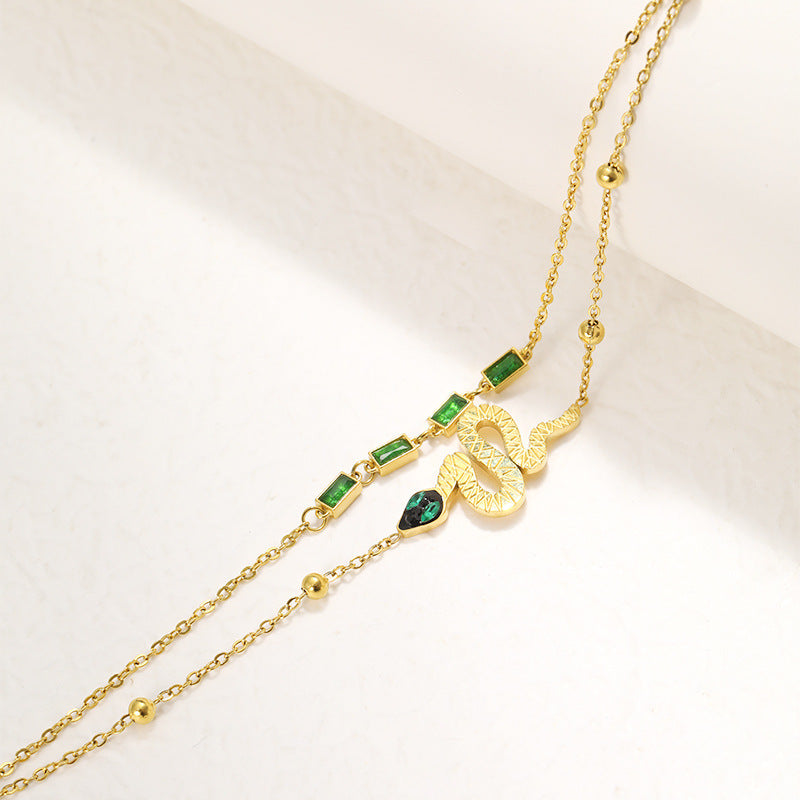 Serpent Charm Bracelet with Green Gem Accents – Dual Layer Gold Chain JLTB0547