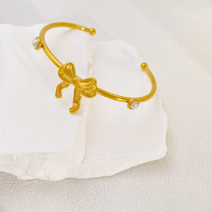Vintage Bow Shaped Dual Pearl Inlaid Gold-tone Bracelet JLTB0640