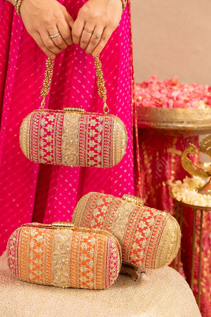 AMYRA - Naaz Capsule clutch - Red and Gold