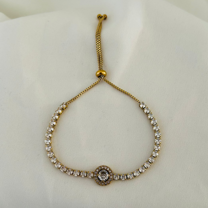 Adjustable gold bracelet with round crystal center