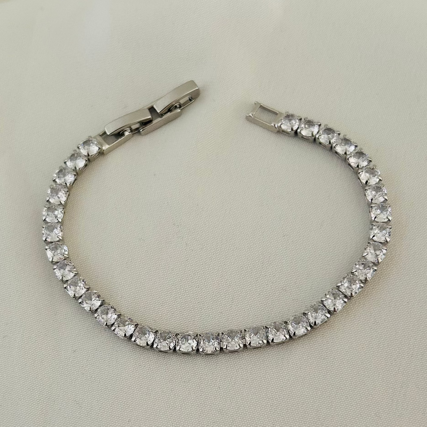 Silver tennis bracelet with white stones