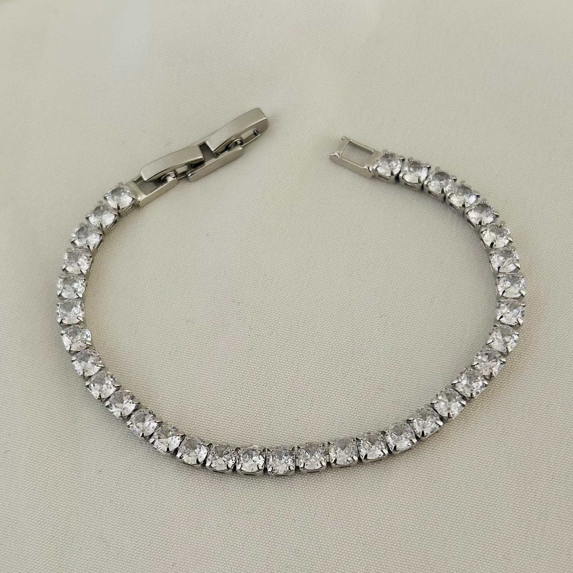 Silver tennis bracelet with white stones