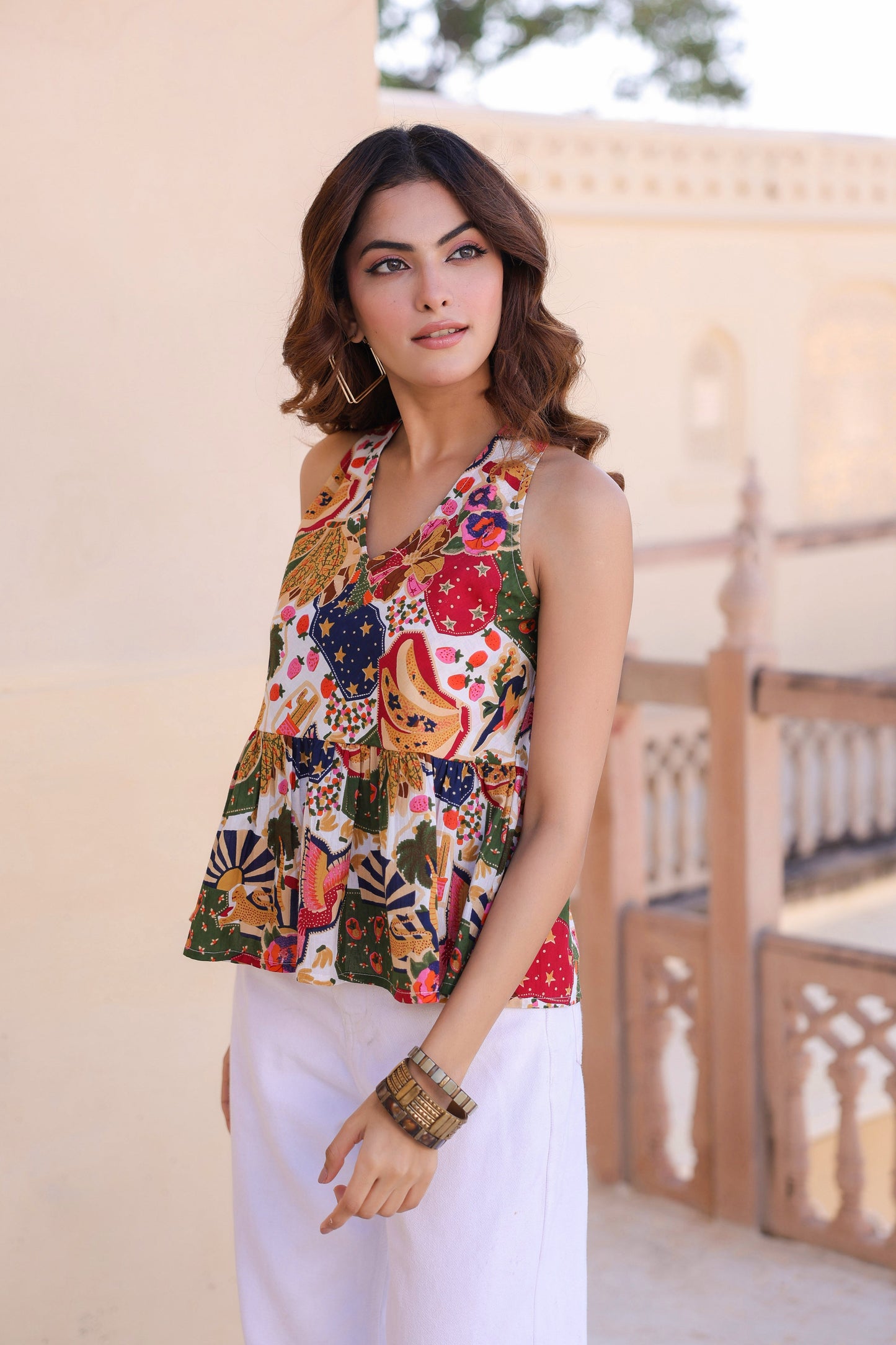 sleeveless white peplum top women